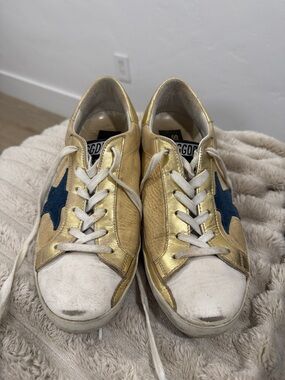 Golden Goose Gold Leather Sneakers with Blue Star